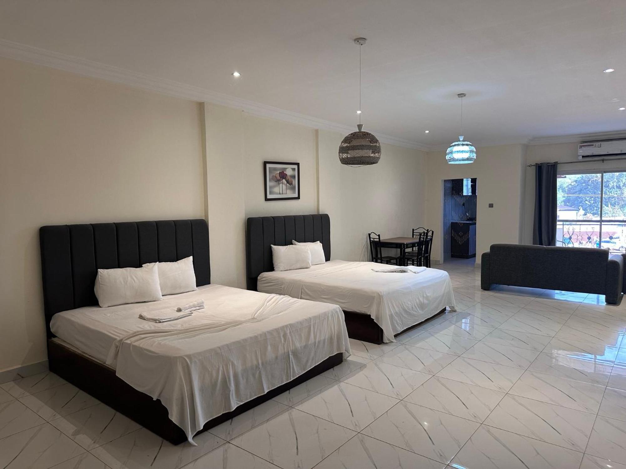 Apartments Plaza Hotel Кололи Экстерьер фото