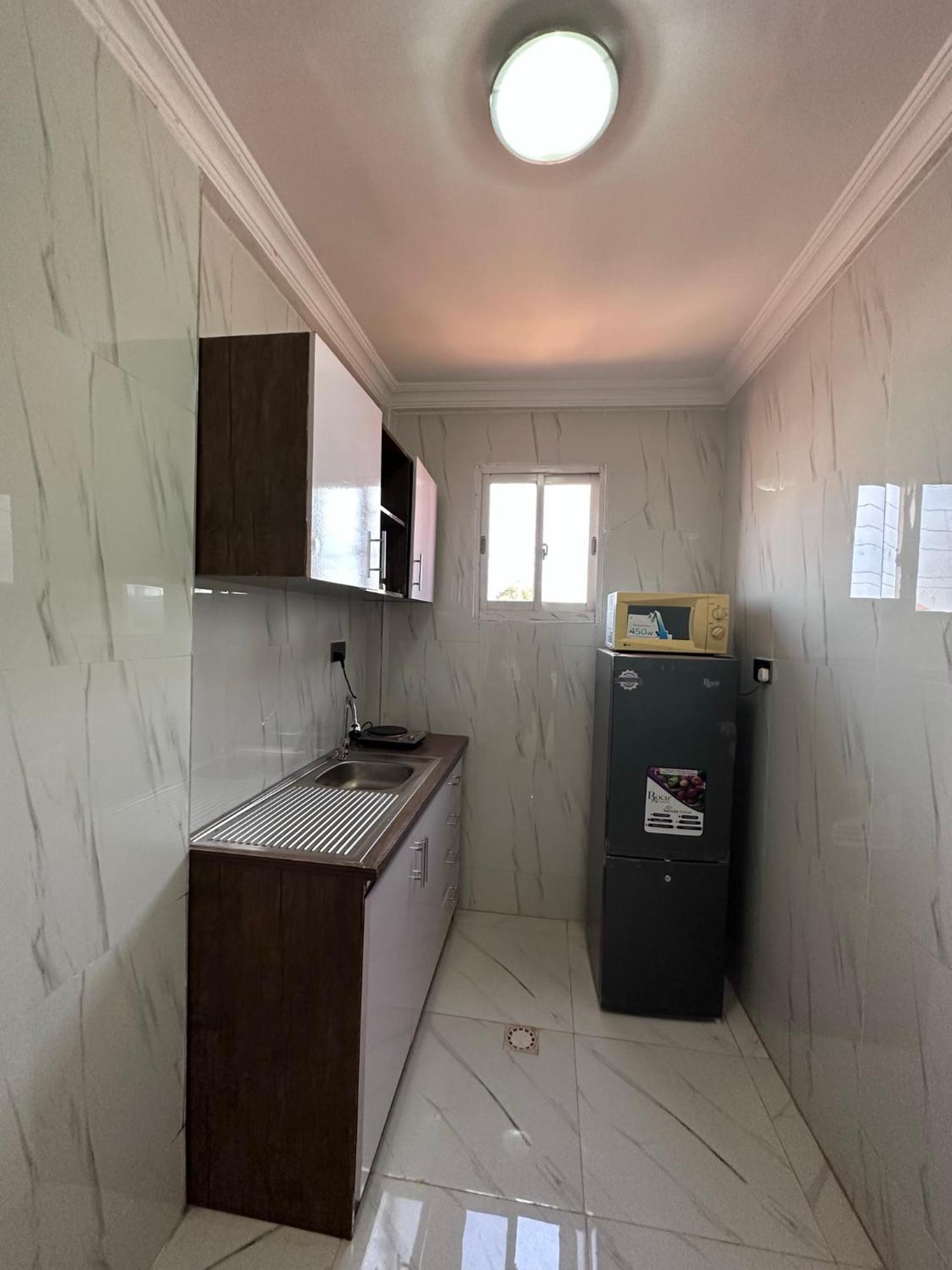 Apartments Plaza Hotel Кололи Экстерьер фото